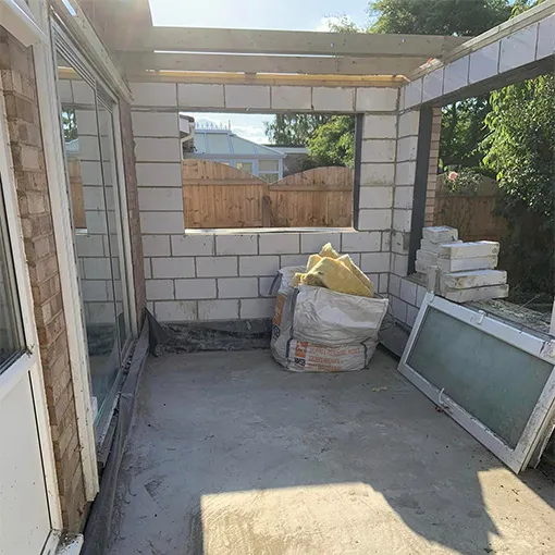 a room that has a bunch of windows in it