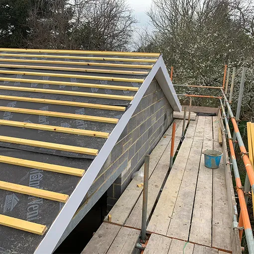the roof of a house is being built